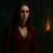 Ultra Hd 2160×3840 Portrait Of Melisandre From Game Of Thrones In Her Crimson Priestess Gown, Illuminated By Torchlight Against A Dark Mystical Backdrop With Glowing Embers