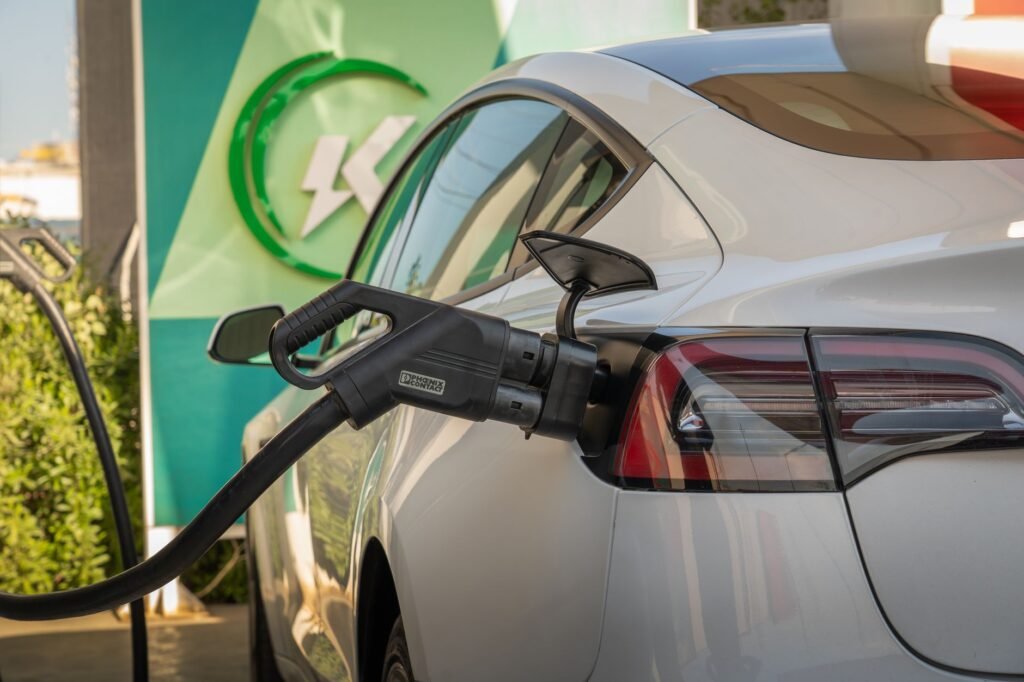 A modern EV charging hub in 2026 showcasing the new standardized charging stations and reliable infrastructure. practical detail