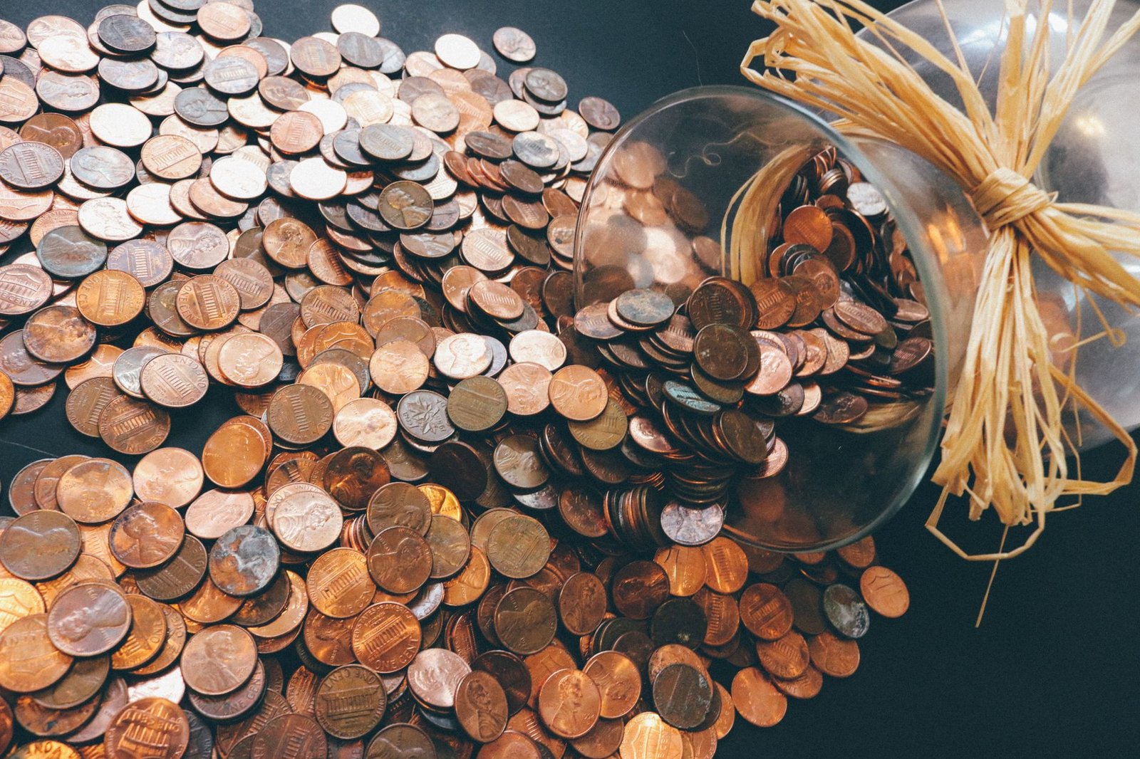Stethoscope and money on a desk representing HSA savings and healthcare costs.