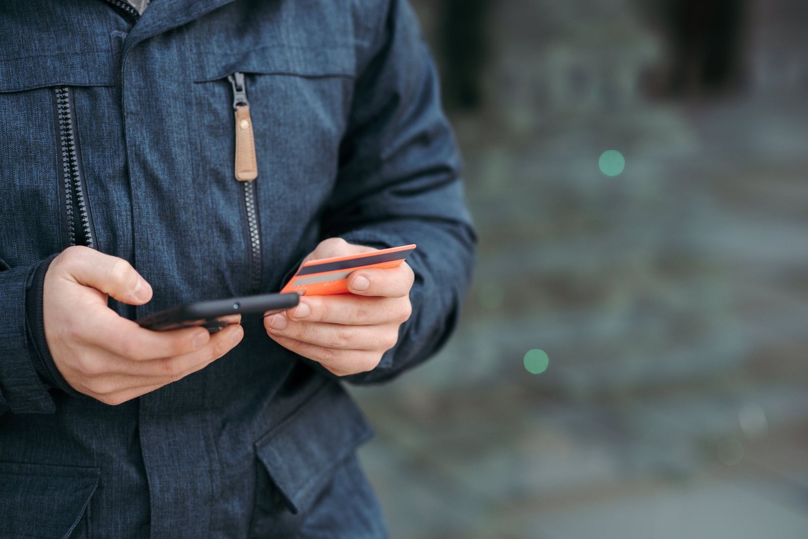 A secure digital wallet payment being made on a smartphone, representing the new 2026 CFPB security rules.