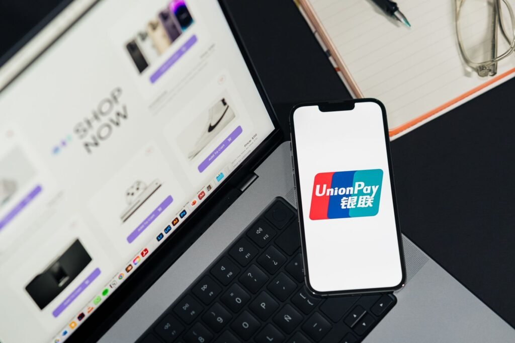 A secure digital wallet payment being made on a smartphone, representing the new 2026 CFPB security rules. practical detail