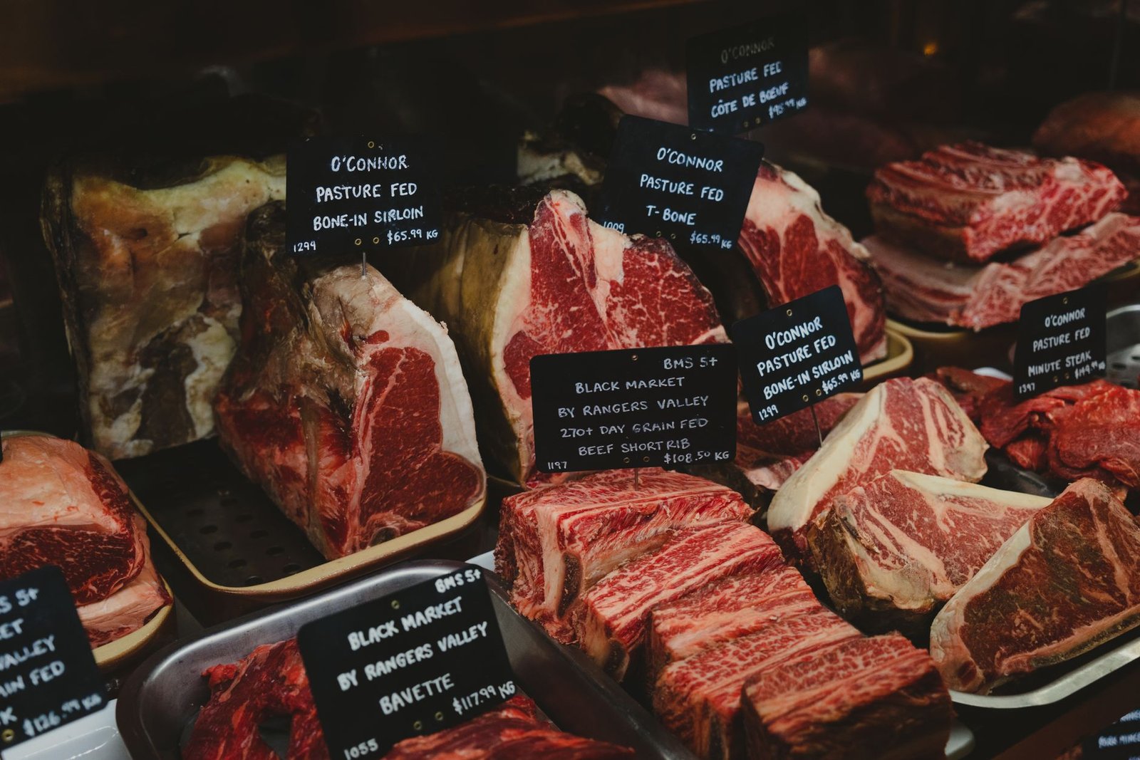 Close-up of a meat package with the Product of USA label in a 2026 grocery store setting.