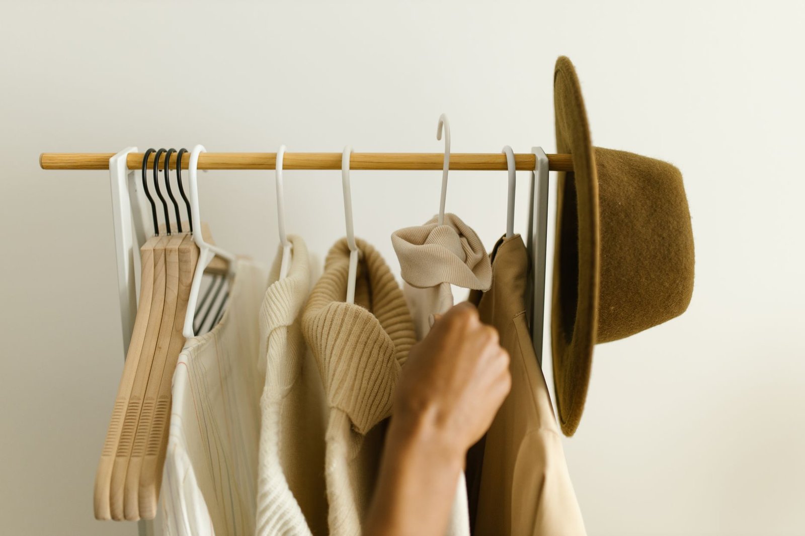 Futuristic sustainable garment made from bio-fabricated materials in a minimalist studio