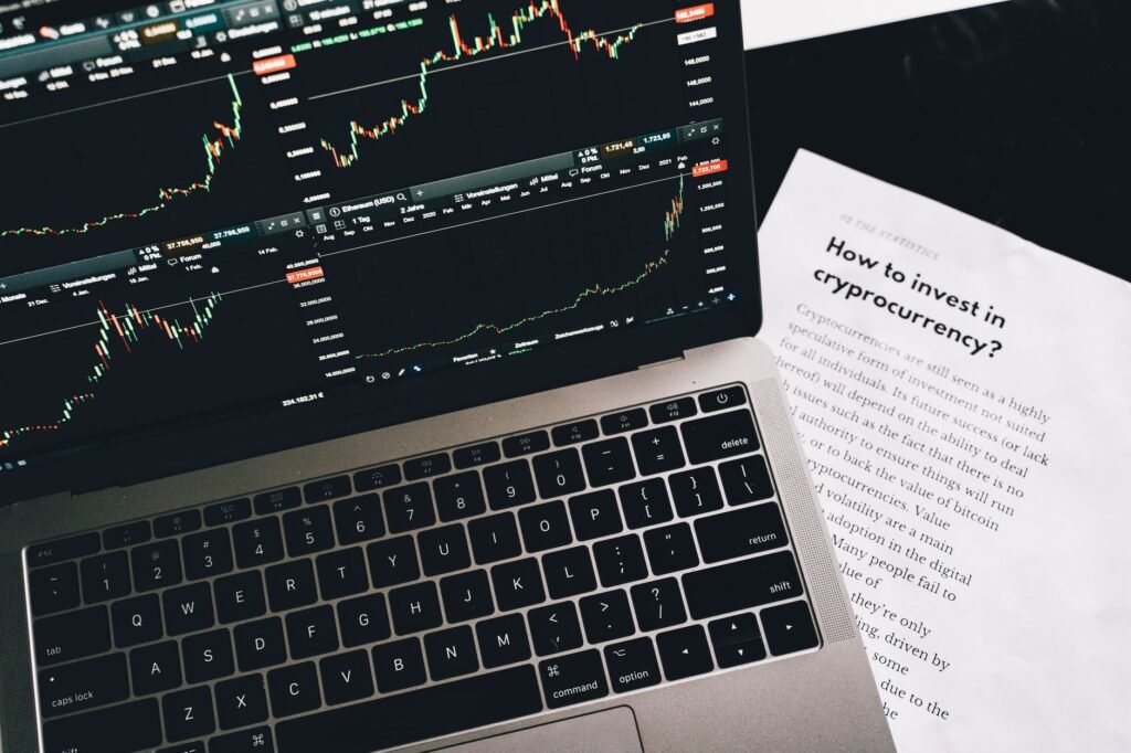 A modern desk showing a smartphone with a financial growth chart, representing the moneymaxxing wealth optimization trend of 2026. practical detail