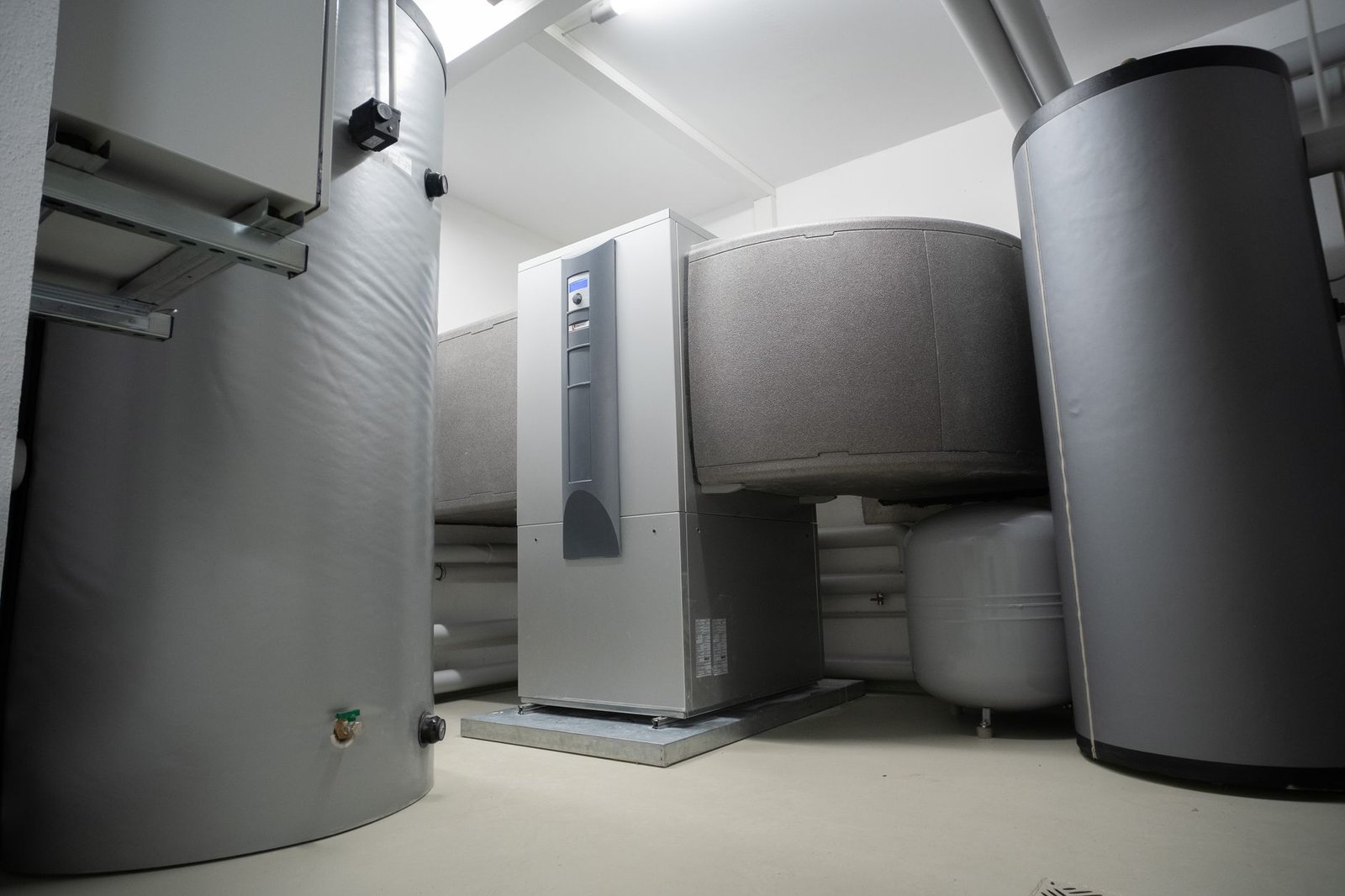 A modern high-efficiency residential heat pump installed outside a home representing the 2026 efficiency standards.