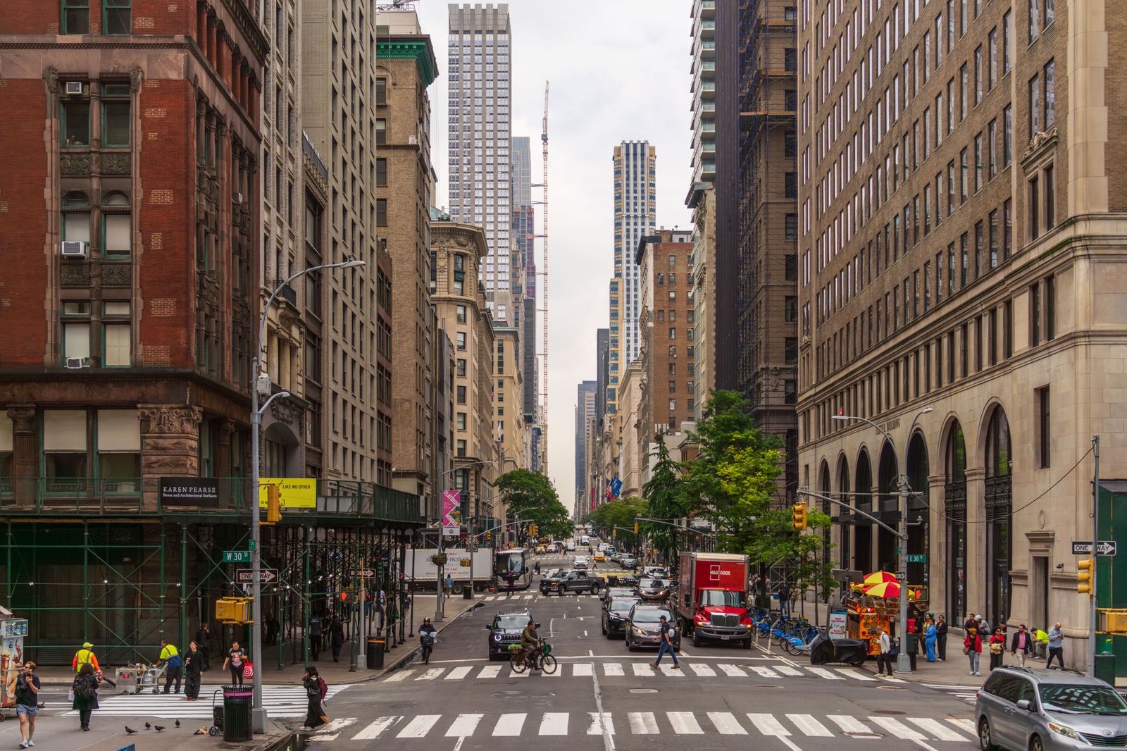 Crowds of people cycling and walking on a car-free Park Avenue during Summer Streets NYC 2026.